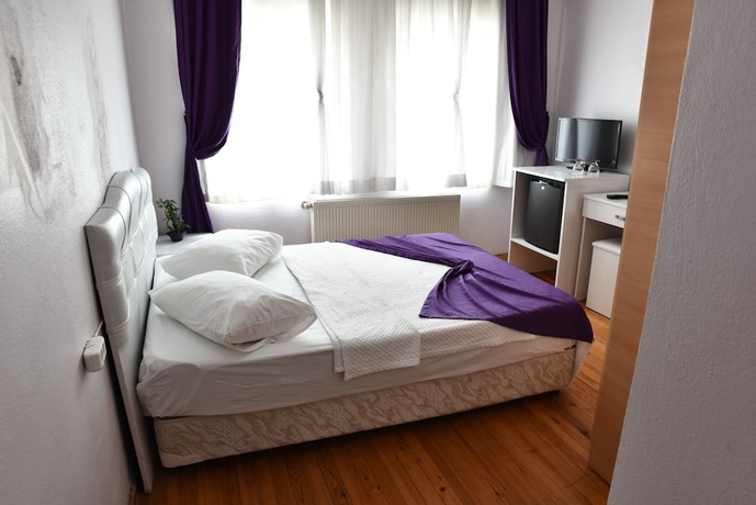 Imagen de la habitación del Cunda Asiyan Butik Otel. Foto 8