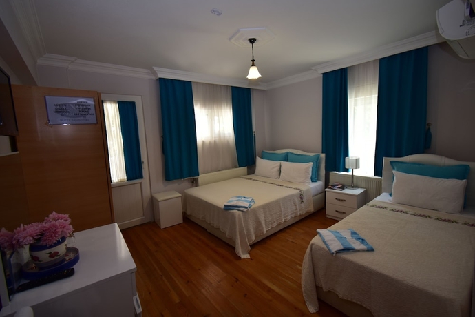 Imagen de la habitación del Cunda Asiyan Butik Otel. Foto 11