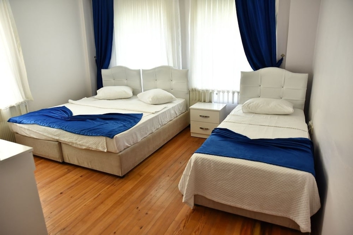 Imagen de la habitación del Cunda Asiyan Butik Otel. Foto 12