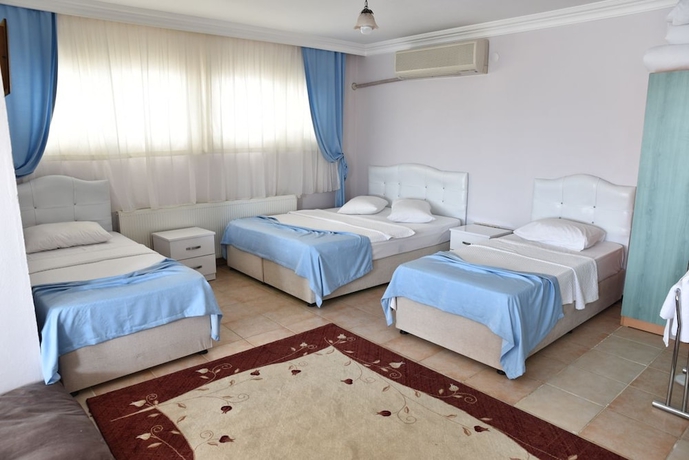 Imagen de la habitación del Cunda Asiyan Butik Otel. Foto 15