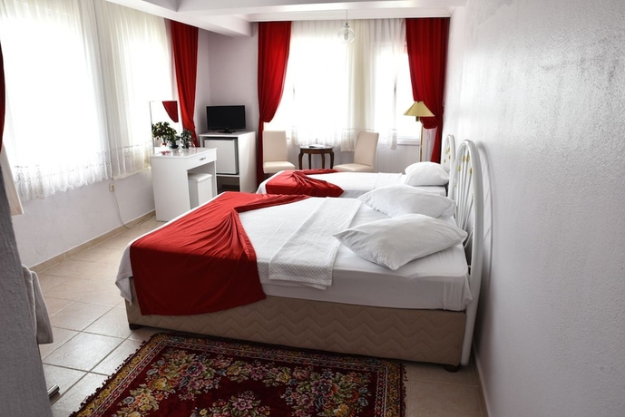 Imagen de la habitación del Cunda Asiyan Butik Otel. Foto 16