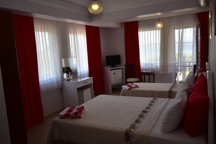 Imagen de la habitación del Cunda Asiyan Butik Otel. Foto 18