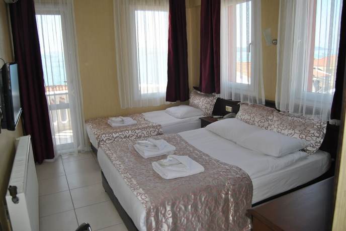 Imagen de la habitación del Cunda Ezer Otel. Foto 8
