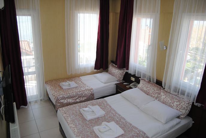 Imagen de la habitación del Cunda Ezer Otel. Foto 9