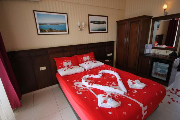 Imagen de la habitación del Cunda Ezer Otel. Foto 11