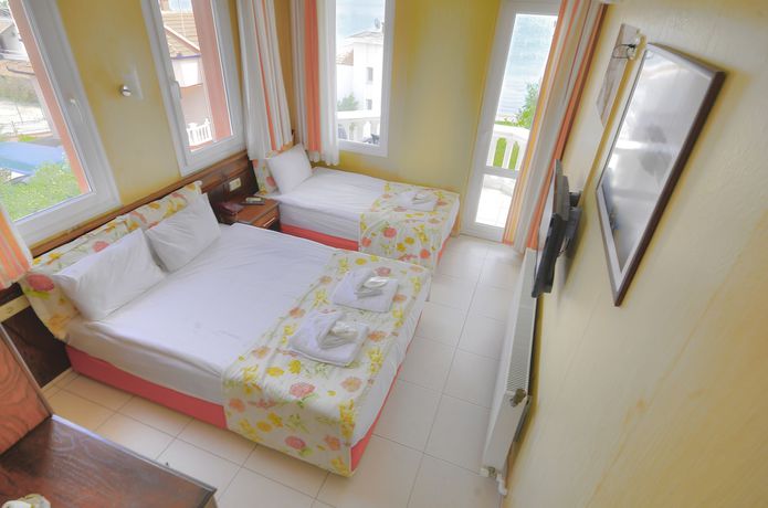 Imagen de la habitación del Cunda Ezer Otel. Foto 12