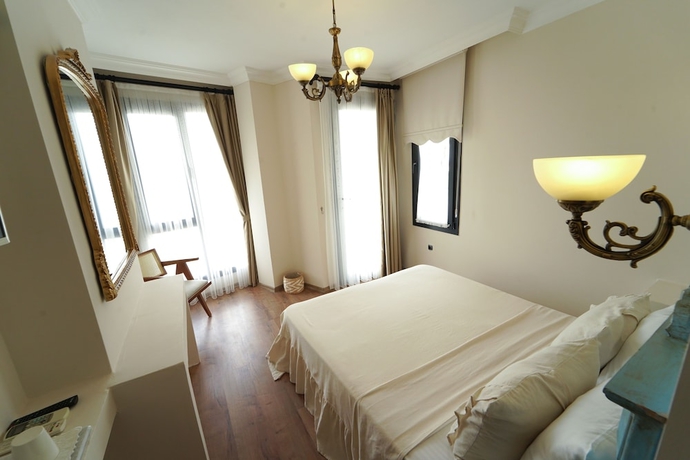 Imagen de la habitación del Cunda House Kucuk Otel. Foto 2