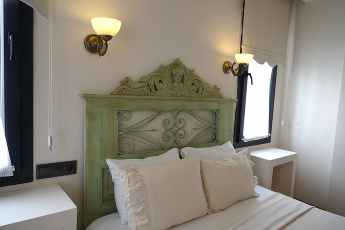 Imagen de la habitación del Cunda House Kucuk Otel. Foto 3