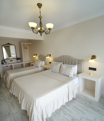 Imagen de la habitación del Cunda House Kucuk Otel. Foto 4