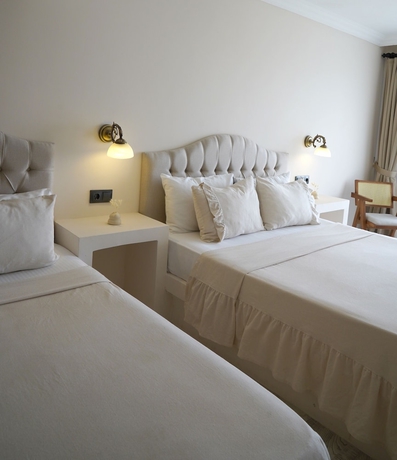 Imagen de la habitación del Cunda House Kucuk Otel. Foto 5