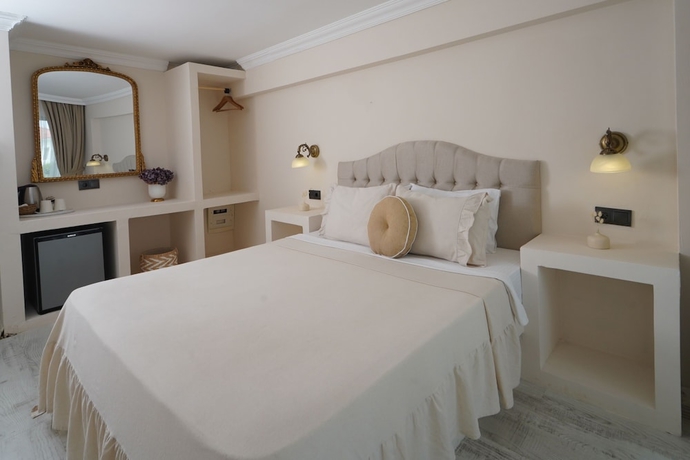 Imagen de la habitación del Cunda House Kucuk Otel. Foto 6