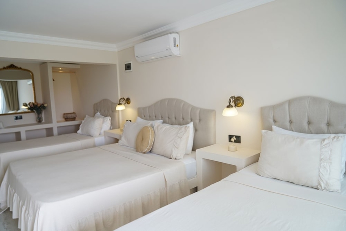 Imagen de la habitación del Cunda House Kucuk Otel. Foto 7