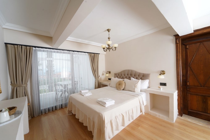Imagen de la habitación del Cunda House Kucuk Otel. Foto 8