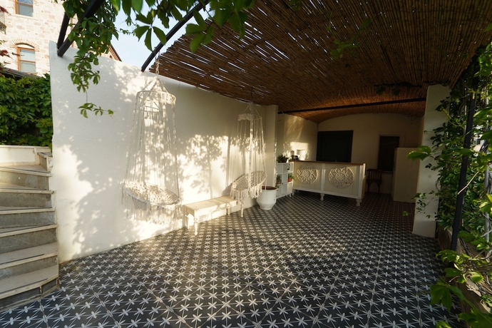 Imagen de los interiores del Cunda House Kucuk Otel. Foto 19
