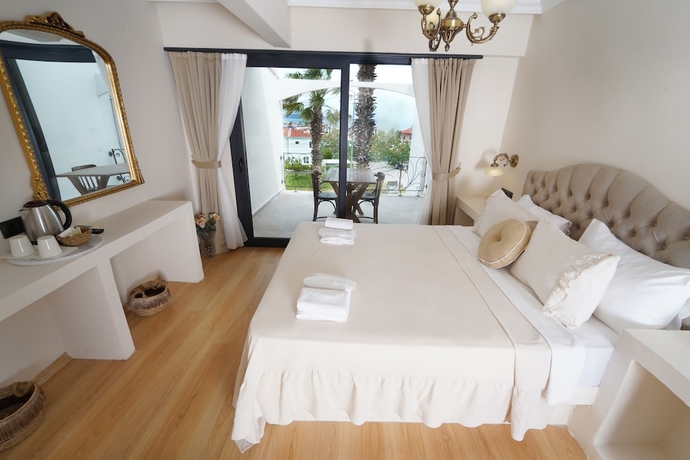 Imagen de la habitación del Cunda House Kucuk Otel. Foto 16
