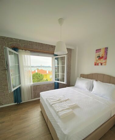 Imagen de la habitación del Cunda Kordon Otel. Foto 18