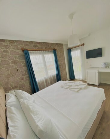 Imagen de la habitación del Cunda Kordon Otel. Foto 19
