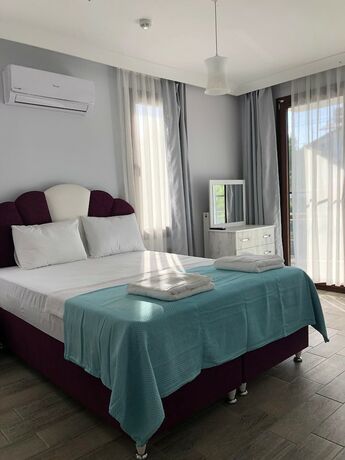 Imagen de la habitación del Cunda Limon Otel. Foto 19