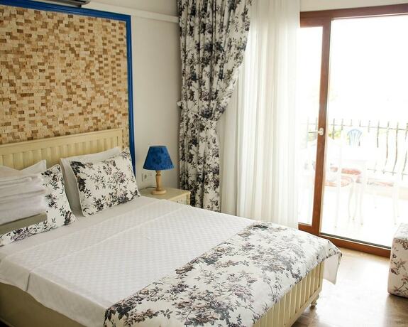 Imagen de la habitación del Cunda Paradise Butik Otel. Foto 20