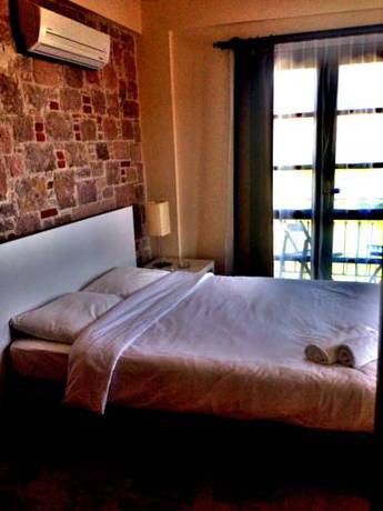 Imagen de la habitación del Cunda Vrodi Hotel. Foto 6