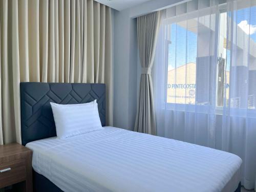 Imagen de la habitación del D\' Elmer\'s Place Hotel. Foto 15