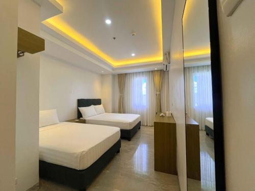 Imagen general del D\' Elmer\'s Place Hotel. Foto 6