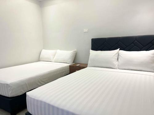 Imagen de la habitación del D\' Elmer\'s Place Hotel. Foto 18