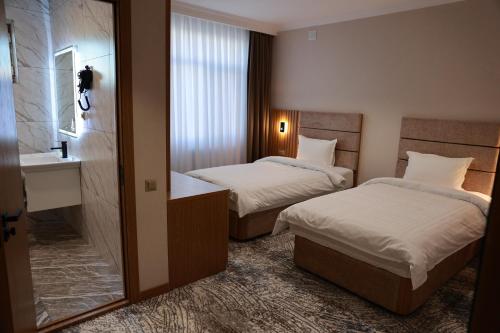 Imagen de la habitación del DAMIR HOTEL. Foto 8