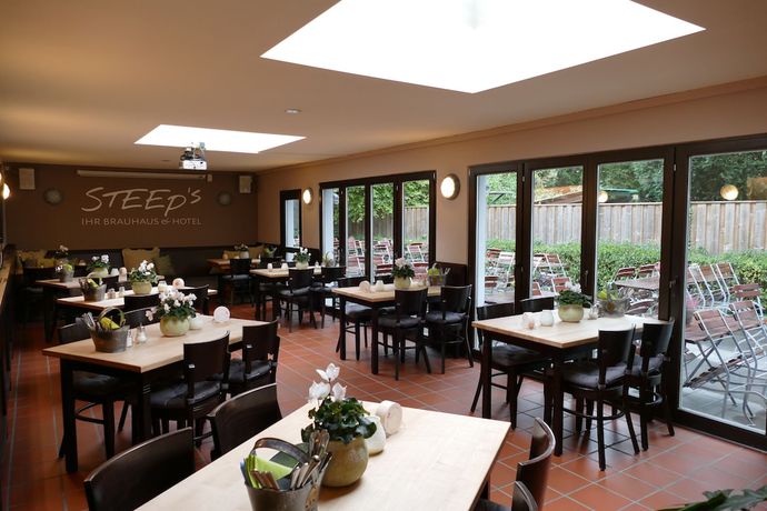 Imagen del bar/restaurante del DAS Steeps Ihr Brauhaus und Hotel. Foto 3