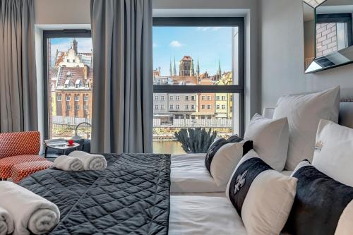 Imagen de la habitación del DEO PLAZA Suites & Riverside by Downtown Apartments. Foto 14