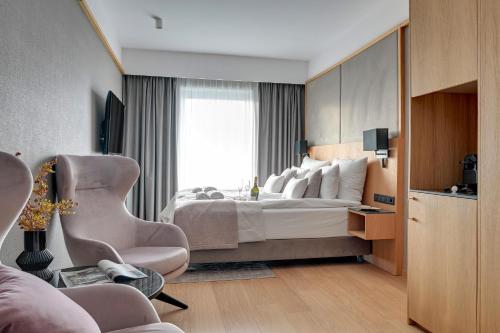 Imagen de la habitación del DEO PLAZA Suites & Riverside by Downtown Apartments. Foto 16