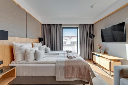 Imagen de la habitación del DEO PLAZA Suites & Riverside by Downtown Apartments. Foto 18