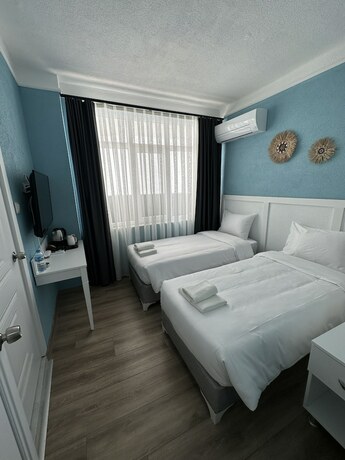 Imagen de la habitación del DERİN BUTİK HOTEL. Foto 10