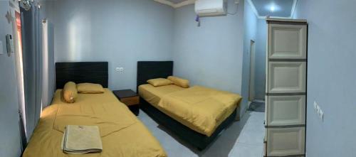Imagen de la habitación del DEWI HOTEL. Foto 15