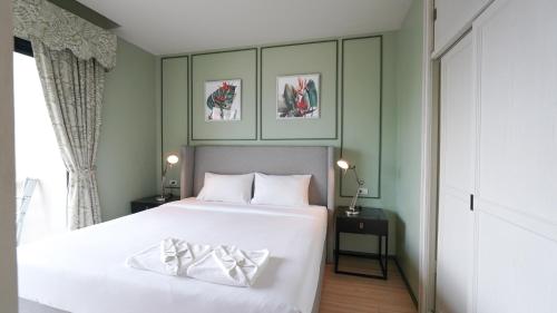 Imagen de la habitación del DLUX Condominium Chalong Phuket. Foto 18