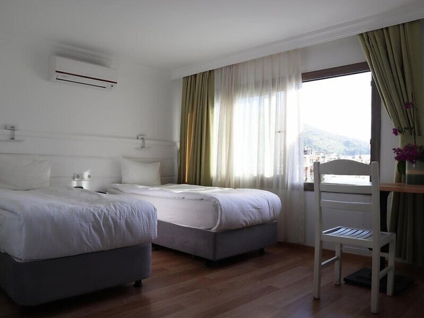Imagen de la habitación del D&Ouml;RTMEVSİM PANSİYON. Foto 4