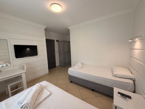 Imagen de la habitación del D&Ouml;RTMEVSİM PANSİYON. Foto 7
