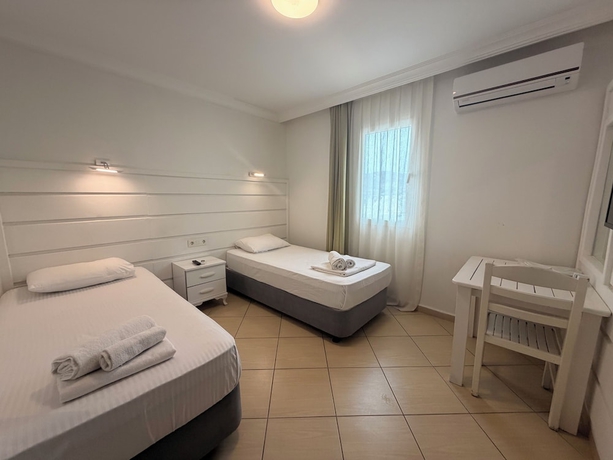 Imagen de la habitación del D&Ouml;RTMEVSİM PANSİYON. Foto 8