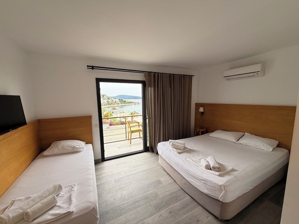 Imagen de la habitación del D&Ouml;RTMEVSİM PANSİYON. Foto 12