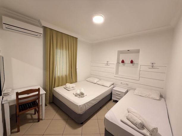 Imagen de la habitación del D&Ouml;RTMEVSİM PANSİYON. Foto 14