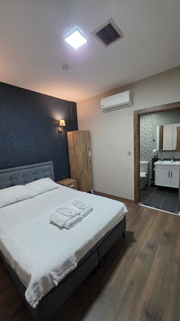 Imagen de la habitación del DUUM SUITE. Foto 9