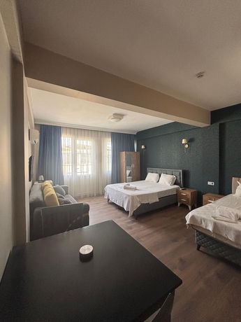 Imagen de la habitación del DUUM SUITE. Foto 13