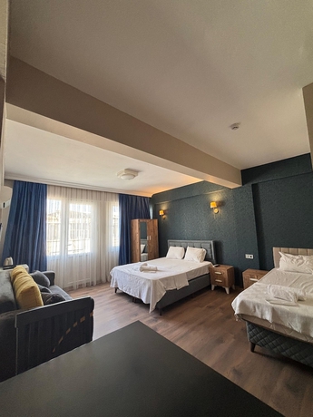 Imagen de la habitación del DUUM SUITE. Foto 14