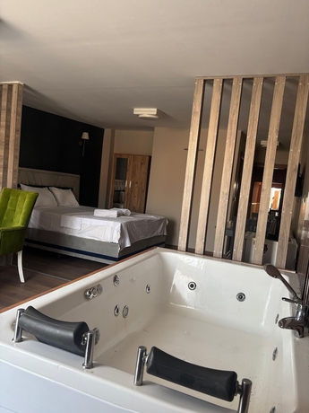 Imagen de la habitación del DUUM SUITE. Foto 15