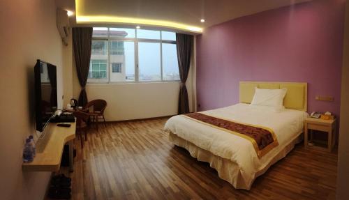 Imagen de la habitación del Da Cheng Yun Xi Hotel. Foto 7
