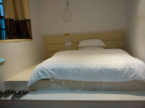 Imagen de la habitación del Da Jie Xiao Xiang Ke Zhan. Foto 1