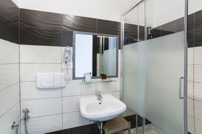 Imagen de la habitación del Dada Suites. Foto 7