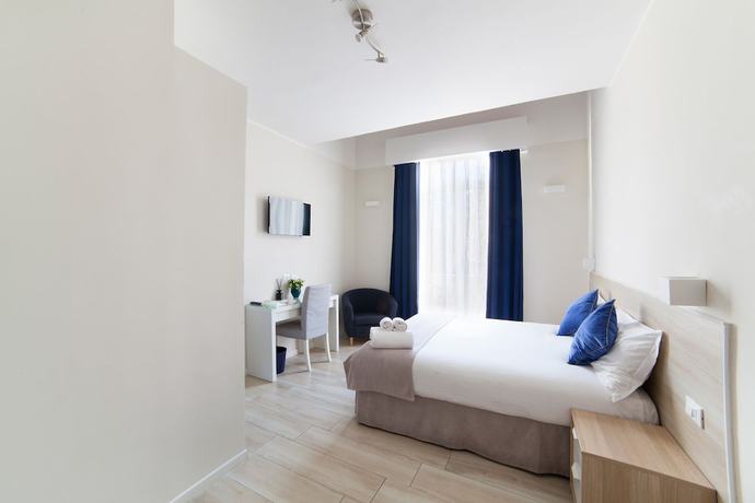 Imagen de la habitación del Dada Suites. Foto 10