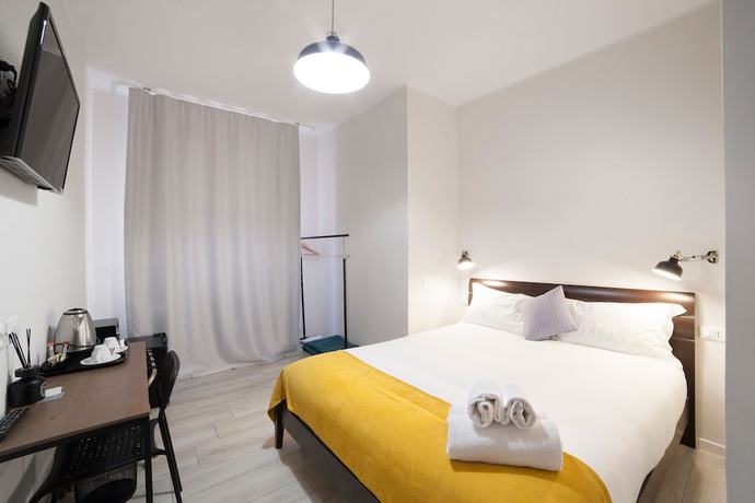 Imagen de la habitación del Dada Suites. Foto 11