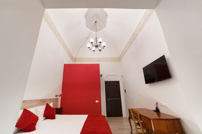 Imagen de la habitación del Dada Suites. Foto 17